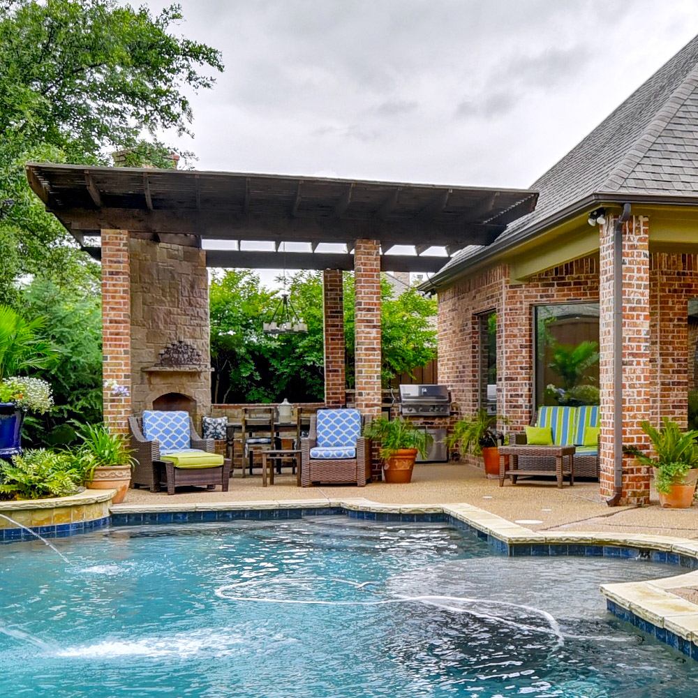Outdoor living room overlooking pool